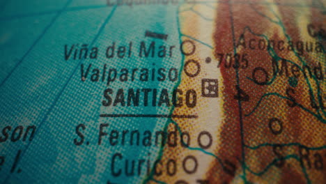 close-up of a world map showing chile's santiago