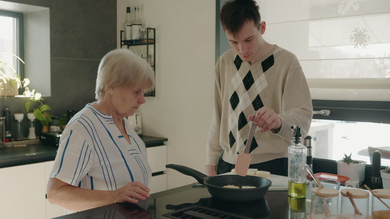 Grandmother and Grandson Cooking Together