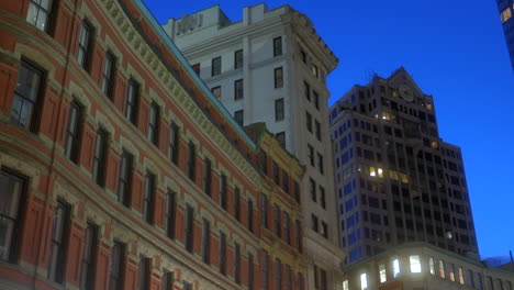 city skyline facades during night in boston, massachusetts, united states