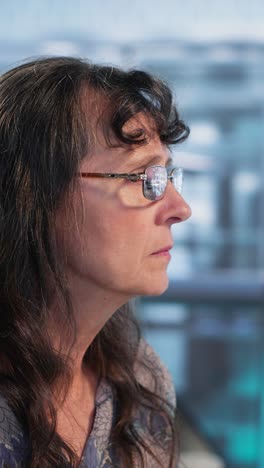 vertical video doctor provides cancer screening guidance to a patient in office
