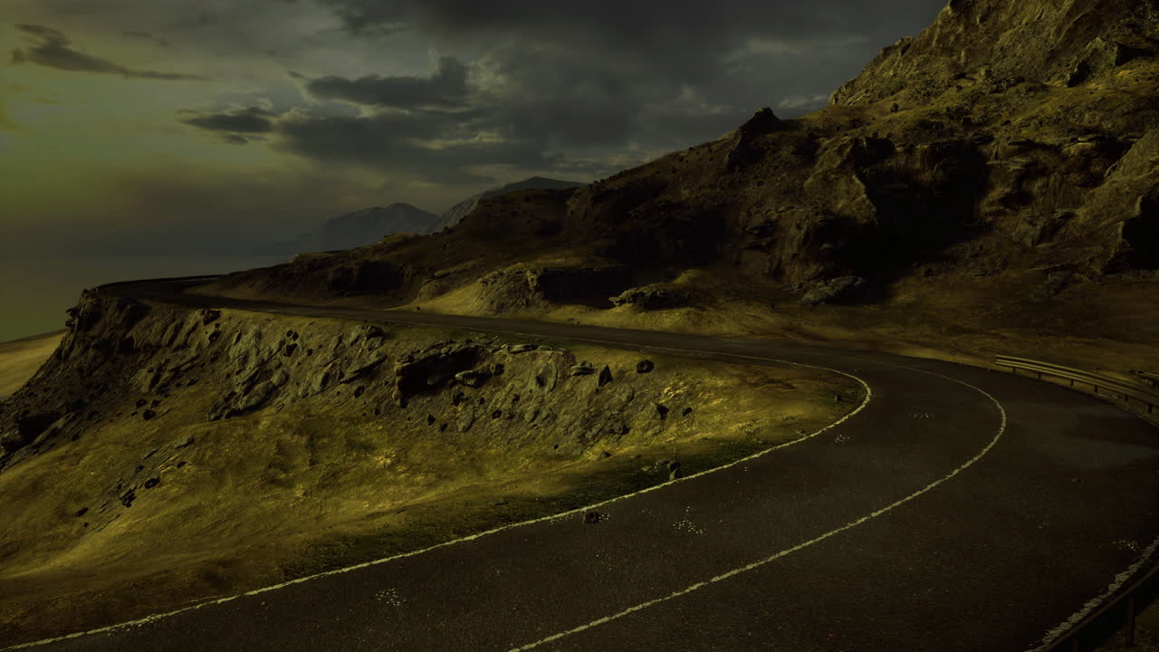 Scenic winding road along rocky cliffs under dark clouds at dusk