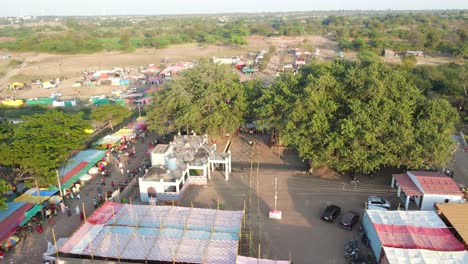 jath maharashtra india festival vibes in villages night bird eye view drone shot night pull back temple festival ferris wheels yellamma yatra at jath in sangli in maharashtra