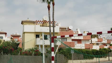 slow motion dolly shot of an empty playground in a spanish village