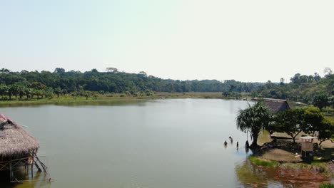 4k daytime aerial drone video looking over the tropical laguna de los milagros in tingo maria, peru