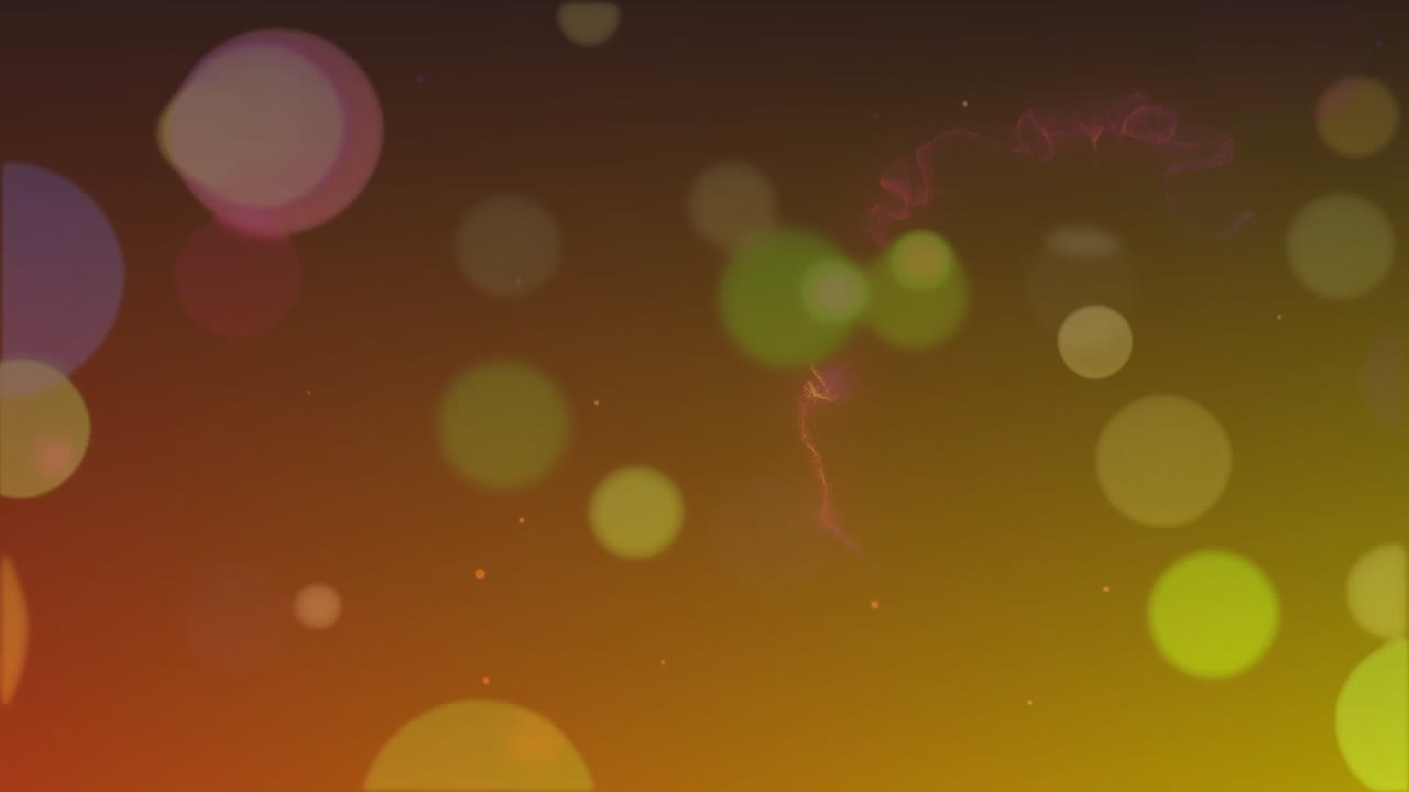 Animation of glowing light spots moving over dark background