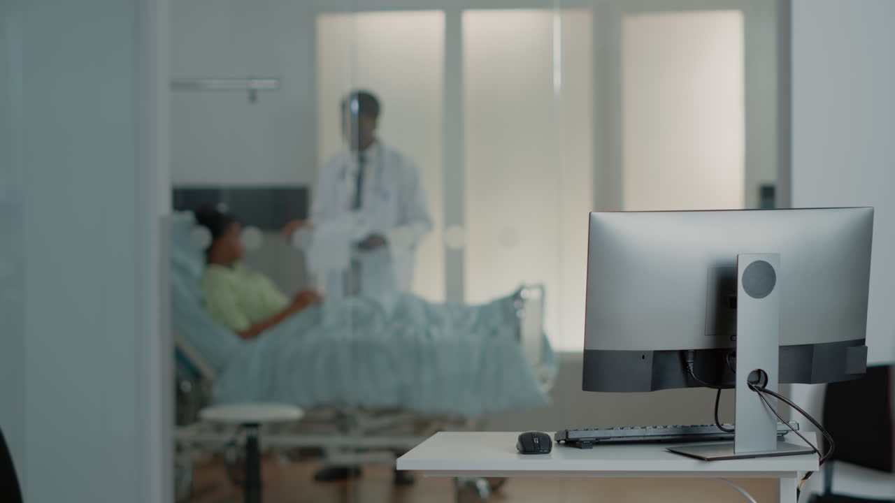 Close up of monitor on desk in empty office at medical clinic