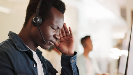 Call-center,-black-man-and-headache-on-computer