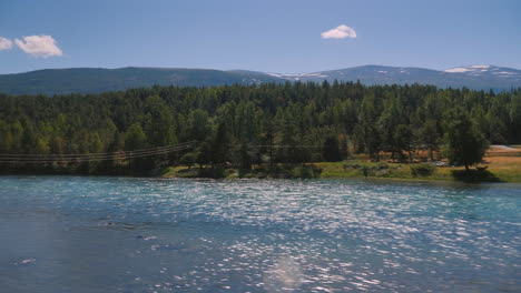 Ride-Along-A-Beautiful-Mountain-River-And-Forest-In-Norway-View-From-A-Car-Window