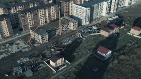 point of interest quick shot of a building being under construction and some tower cranes 4k