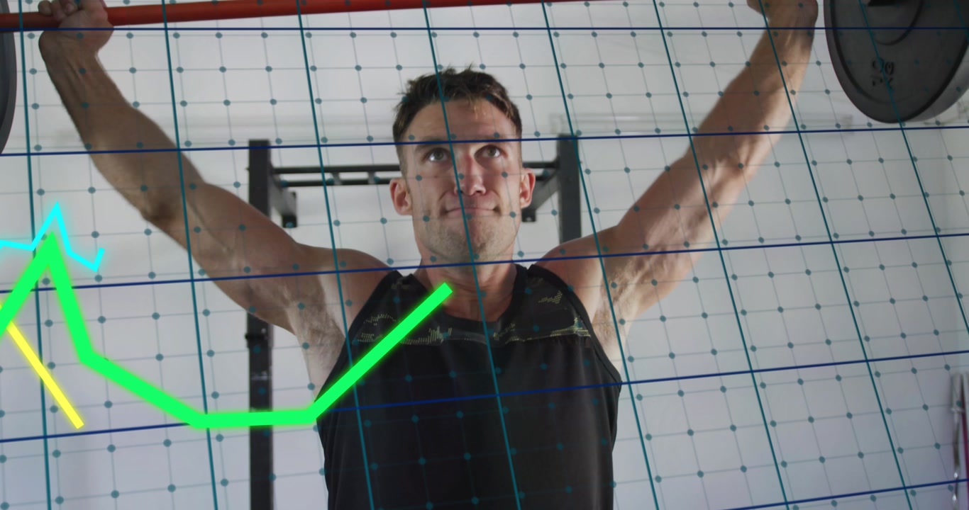 Vertical video: Bracing man pressing bar lowering to floor grabbing at gym for power in black tank