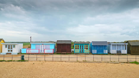 bird's-eye view of mablethorpe's east coast beauty, with beach huts, sandy beaches, amusement parks, rides, and the vibrant tourist presence