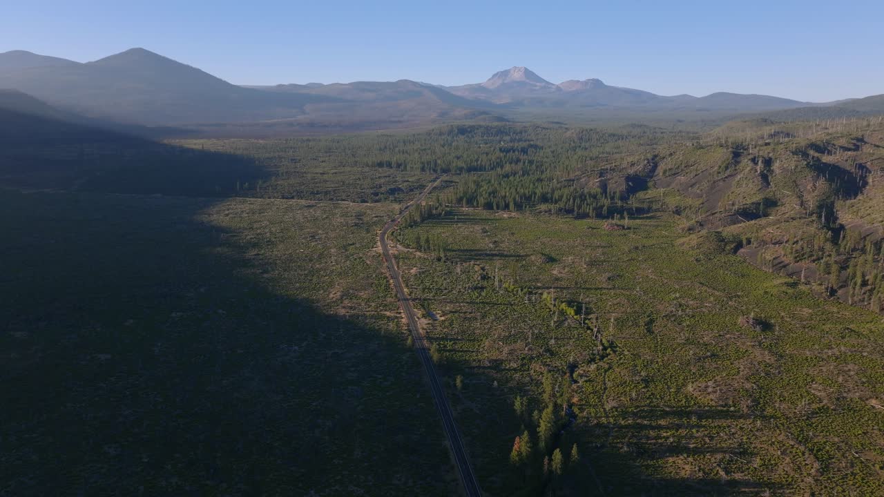Aerial view of Lassen National Park's vast, tranquil landscape at sunset