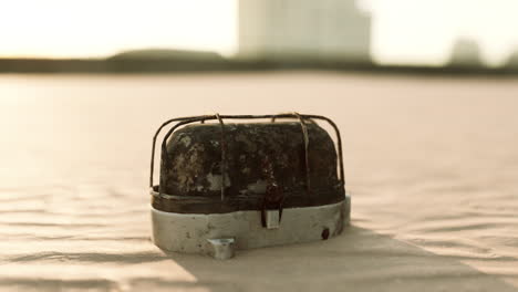 old rusted trash on the sand beach