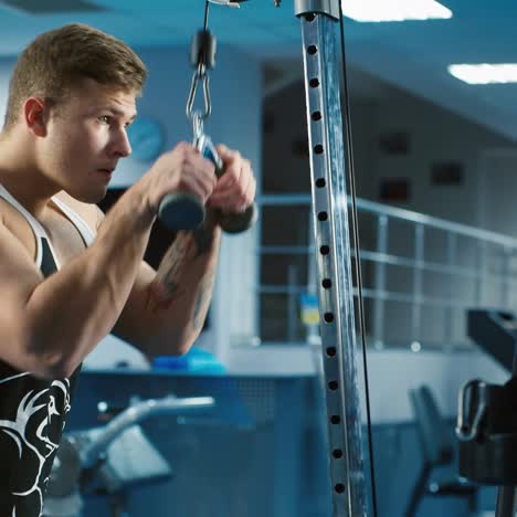 A-young-man-trains-in-a-gym-1