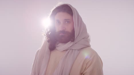 Backlit Portrait Of Man Wearing Robes With Long Hair And Beard Representing Figure Of Jesus Christ 1