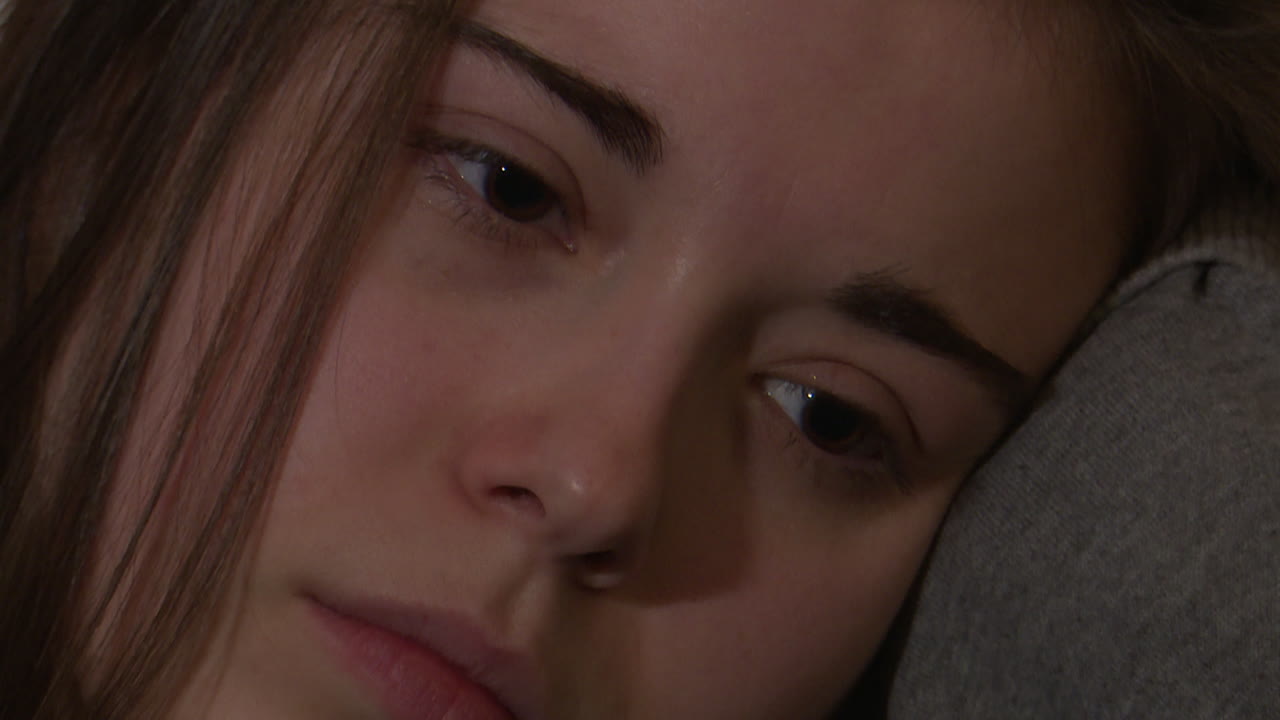 Close-up of a young woman sleeping