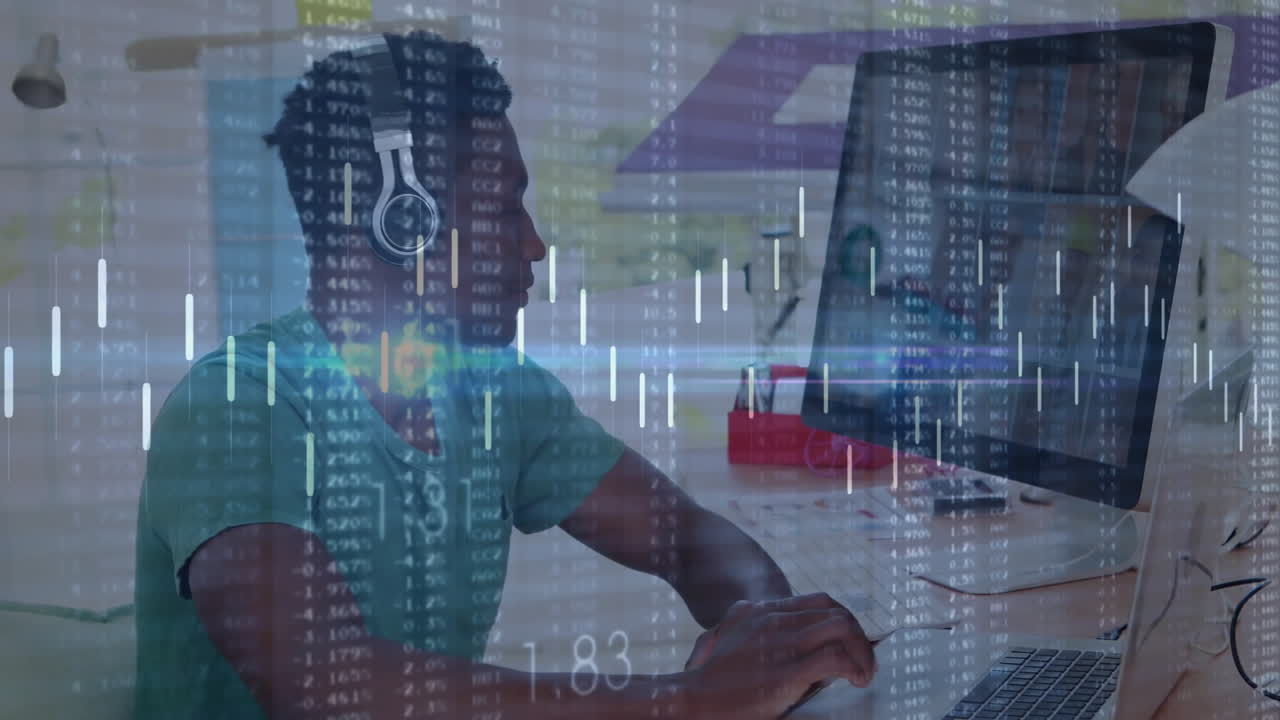 Financial data and stock market animation over man working on computer