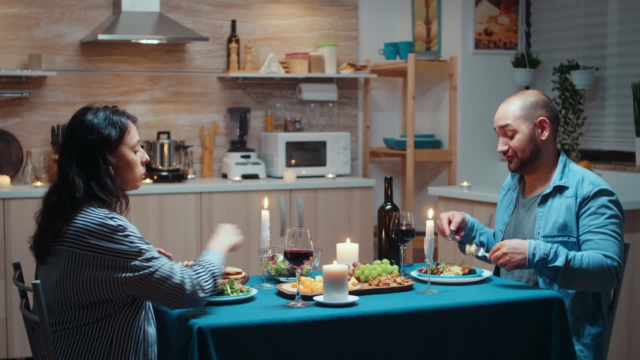 Lovers eating healty food at dinner