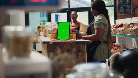 Digital-layout-of-greenscreen-on-tablet-placed-in-farmers-market