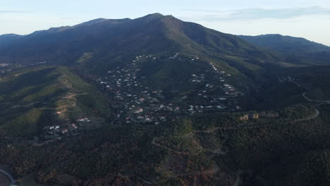 aerial view of a mountain village nestled in a valley