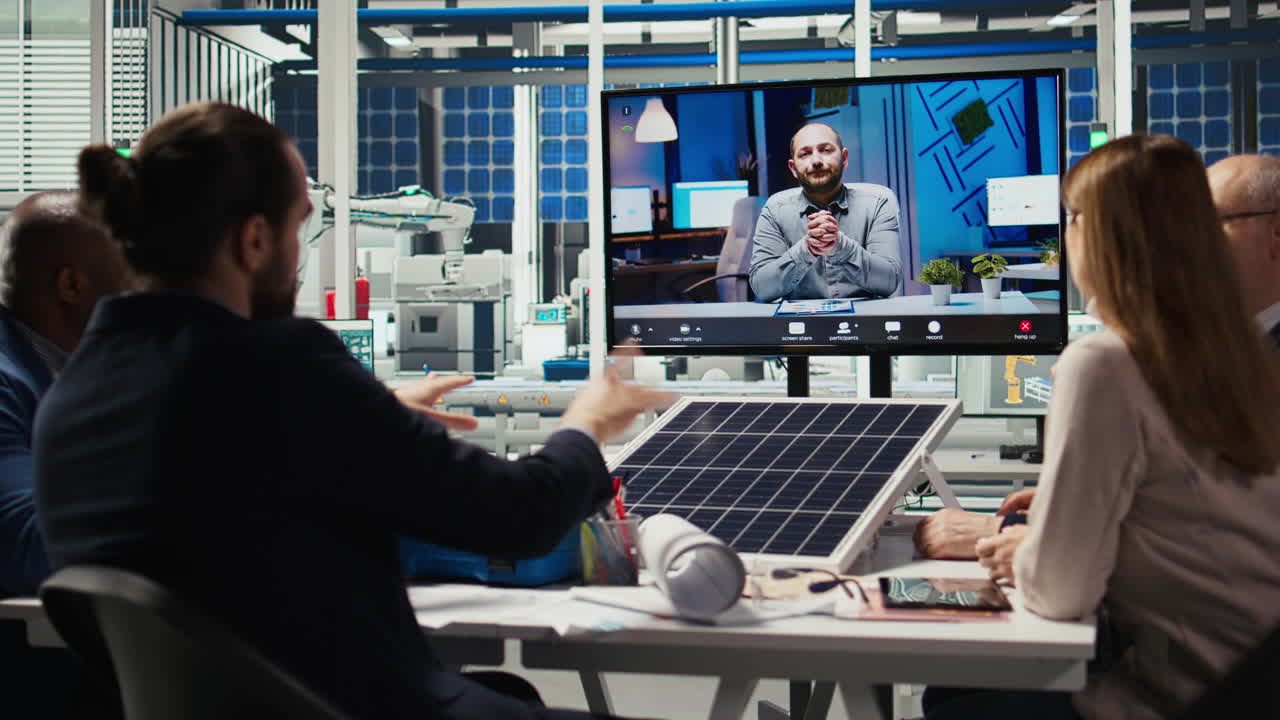Experts Optimize Factory Equipment Energy Output During Videocall Meeting