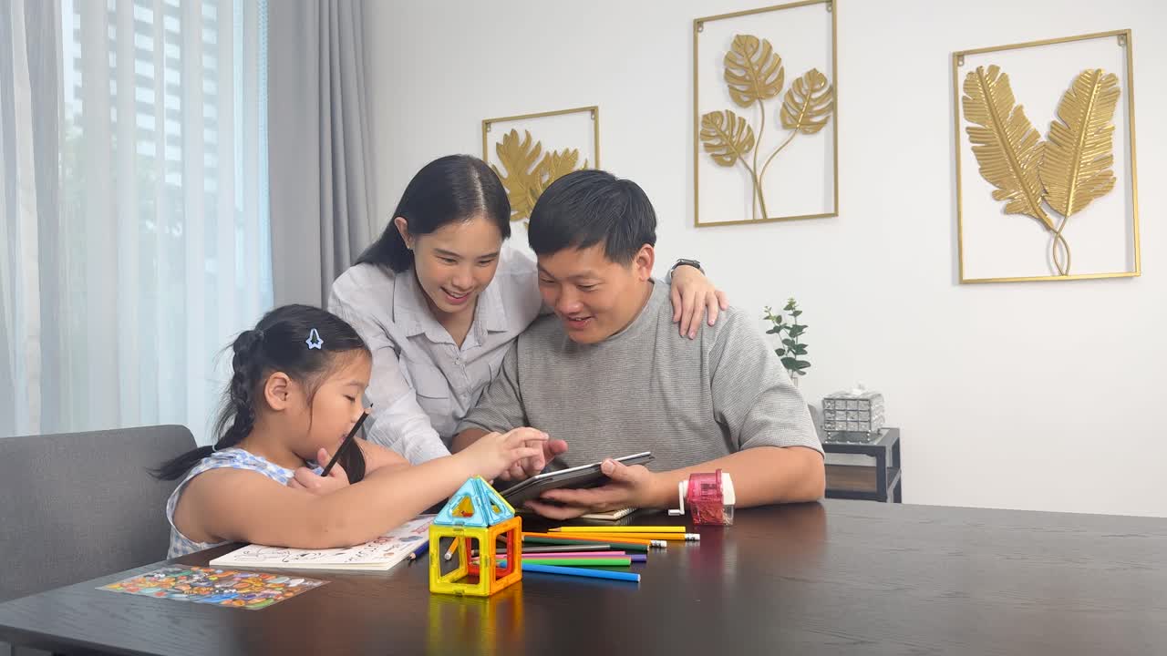 A family helps their daughter with homework at a table, fostering learning and togetherness in a bright, cozy setting