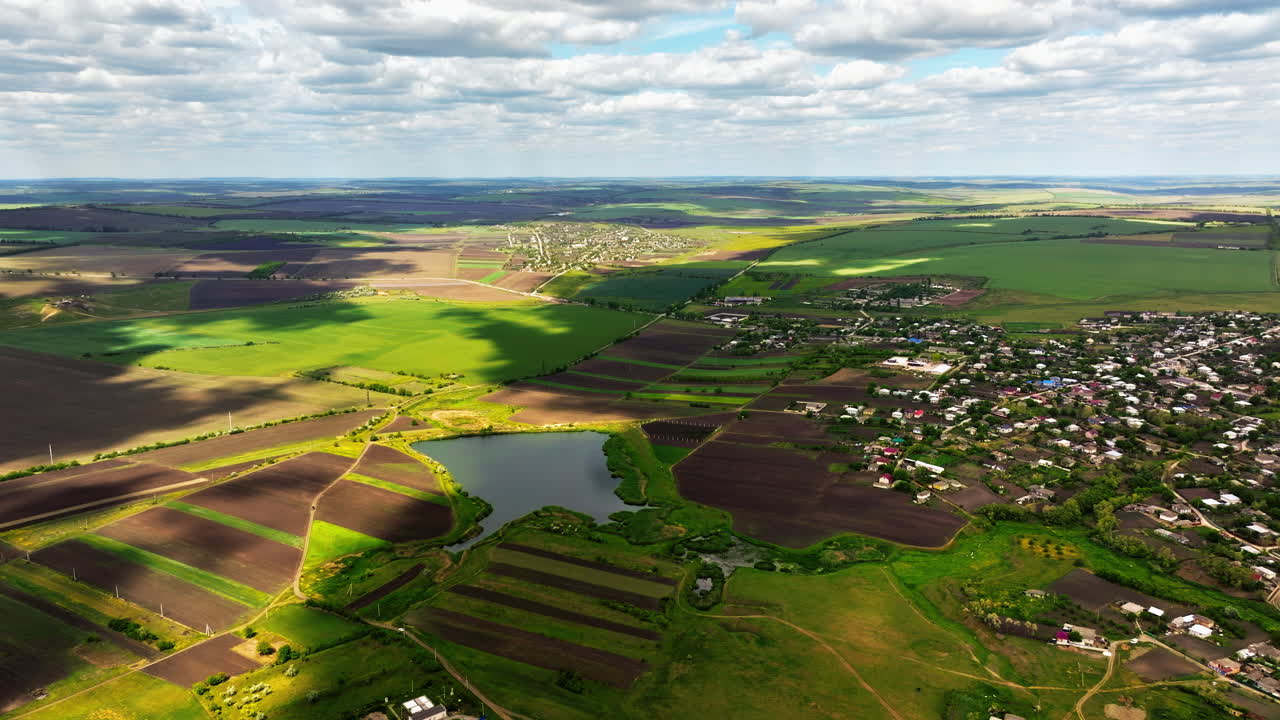 Aerial drone view of Pelinia, Drochia, Moldova with a cloudy sky