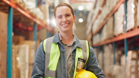 female warehouse worker in safety gear