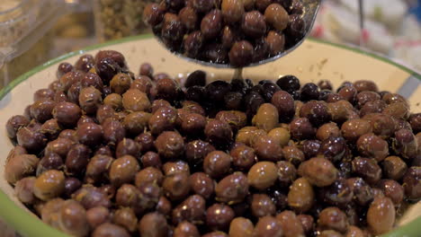 bowl is full with marinated olives