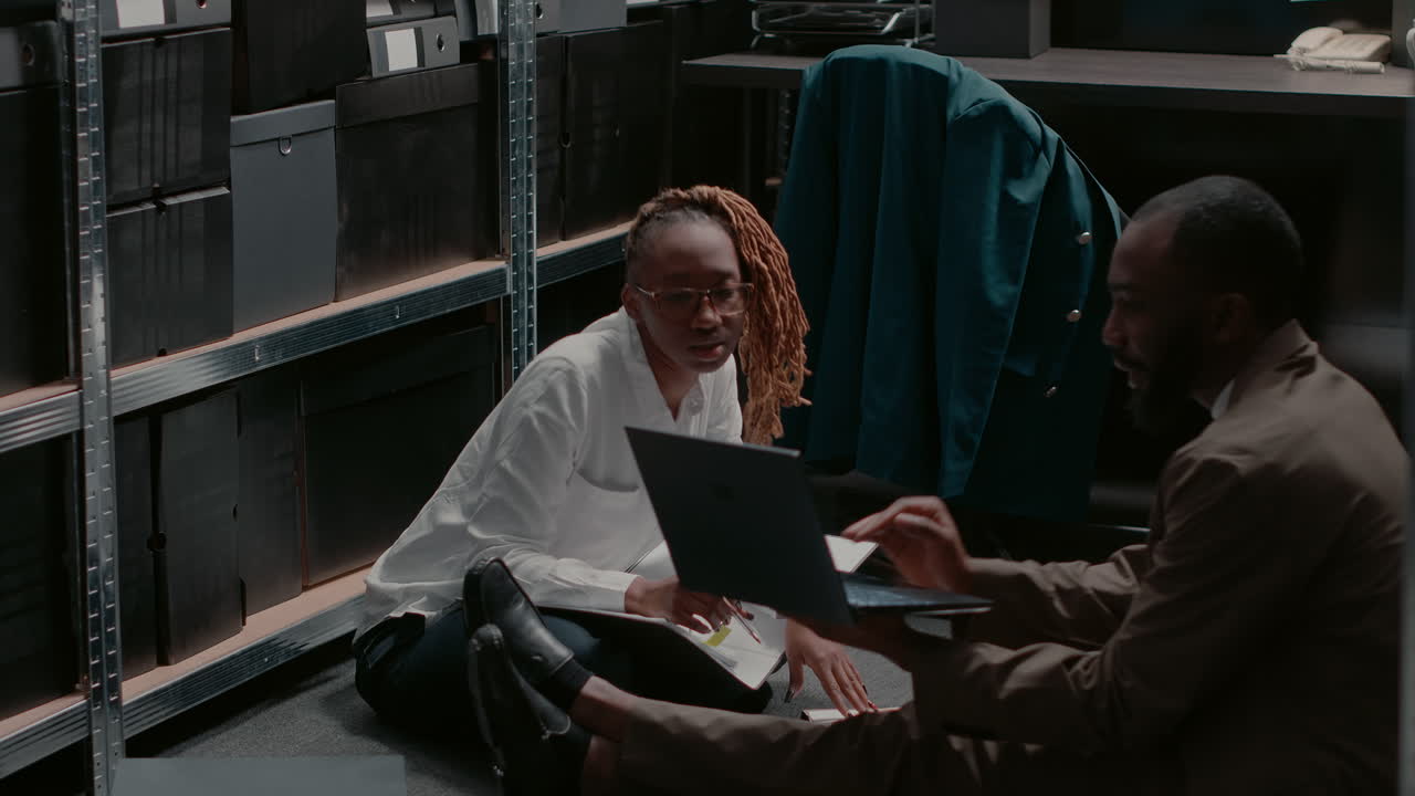 People working together in storage room