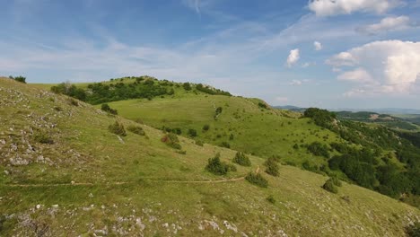 flying over summer hills in serbia