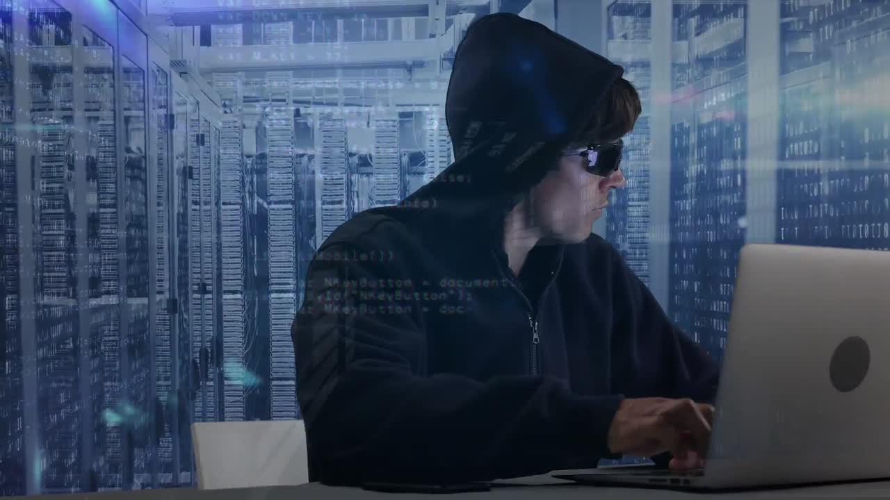Animation of hooded man hacking a computer