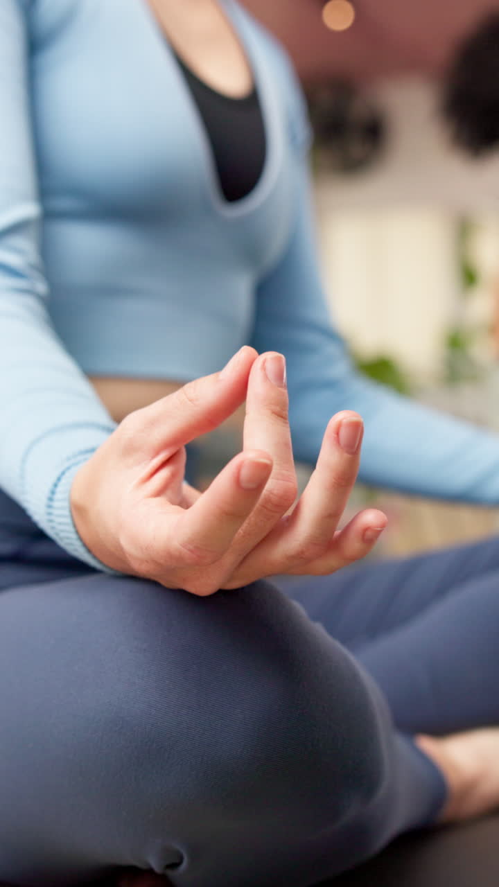 Close-up of Woman's Hand in Mudra During Meditation