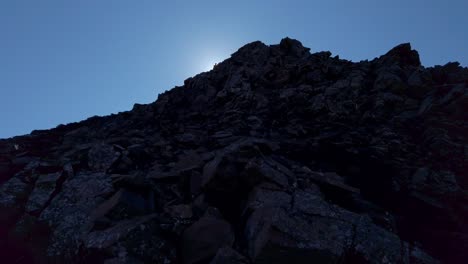 hiker in distance backlit in shade slow motion kananaskis alberta canada