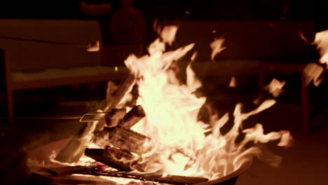 Slow-motion-shot-of-roasting-marshmallows-on-fire-pit