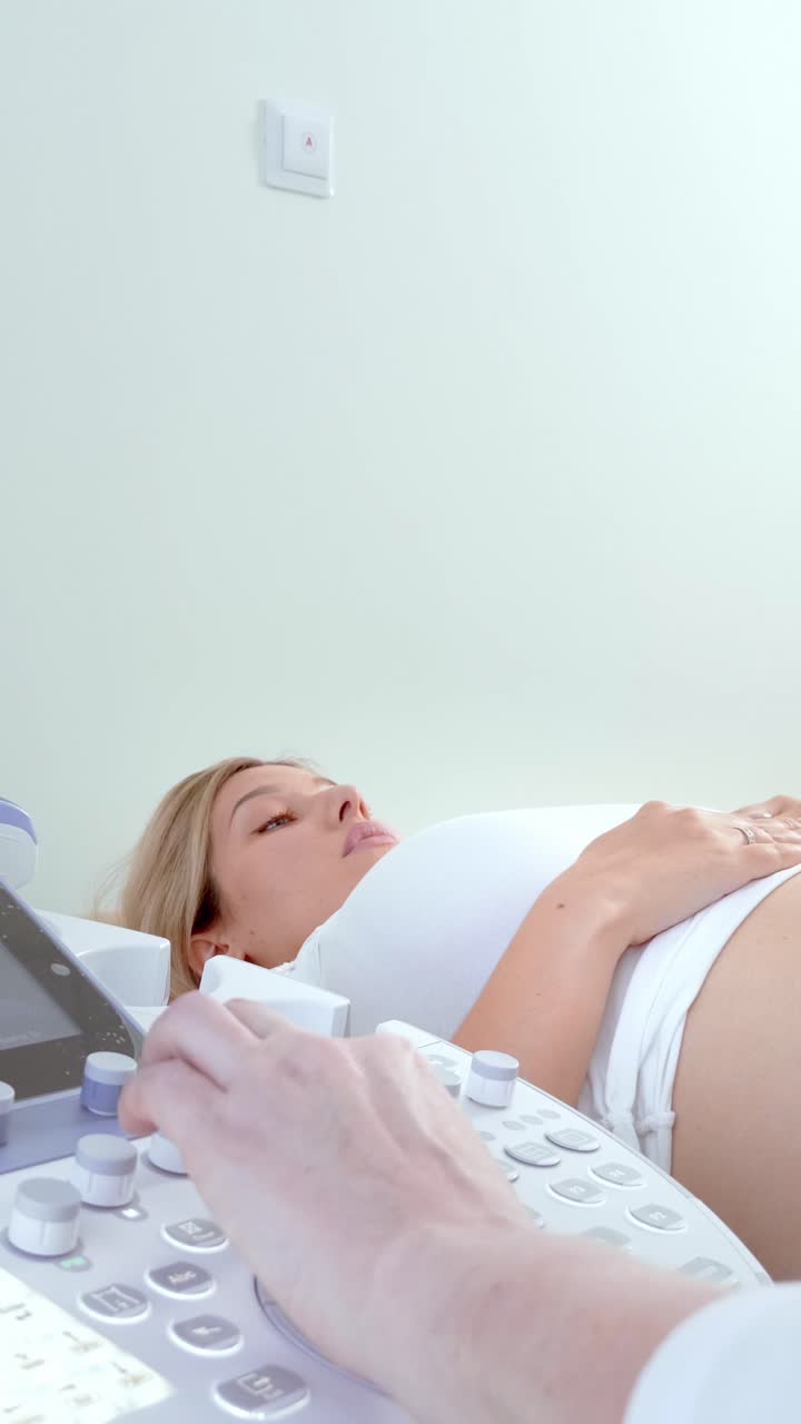 Pregnant woman relaxing on a medical examination table in a bright, serene healthcare environment