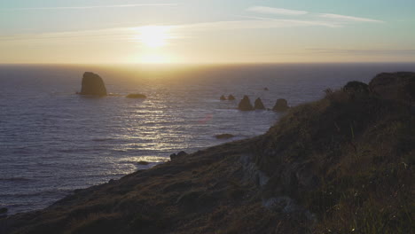 wide angle sunset over pacific ocean, blacklock point oregon coast