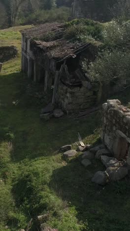 fly above abandoned houses vertical video