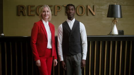 receptionists at the hotel reception desk