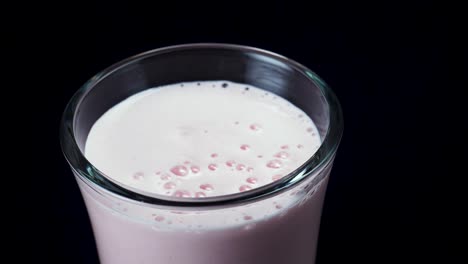 strawberry smoothie in a glass