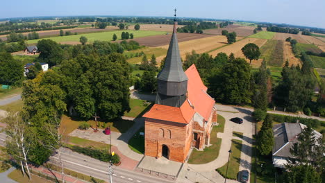 aerial shot of beautiful medieval church in cedry wielkie, poland