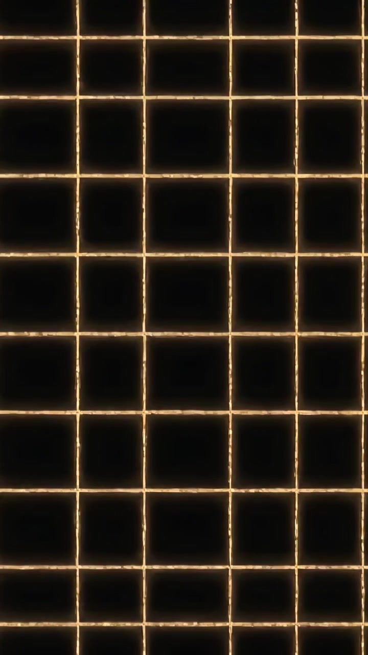Vertical video: Toggling golden grid panel showing inner squares every other frame, filling frame
