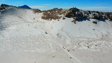 Aerial-footage-of-summit-of-iztaccihuatl-mountain-and-peak-of-popocatepetl-volcano