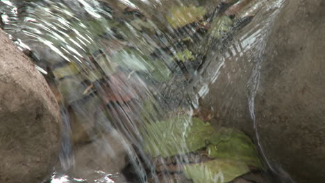 Close-up-tilt-down-a-waterfall-in-Wheeler-Springs-above-Ojai-California