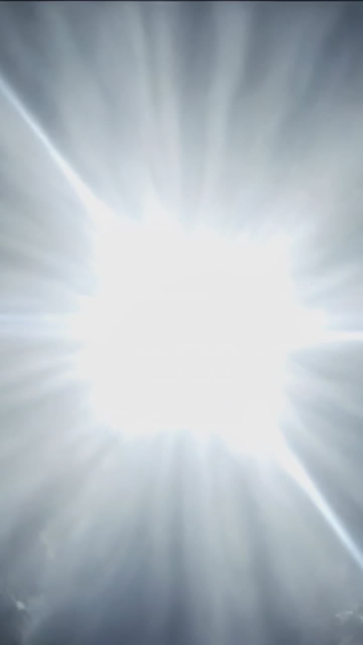 Vertical video: Switching on, focused beam expanding over worn cement floor, washing out seams