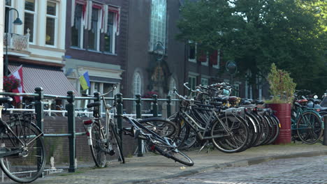 bicycles on the bike rack in the sidewalk in westhaven, gouda, netherlands