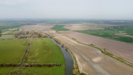 aerial drone shot of the river stour in kent, england