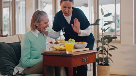 Woman,-nurse-and-breakfast-on-sofa-in-elderly