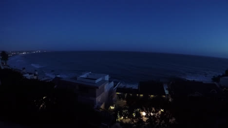 a hyper-lapse shot of malibu from day to night