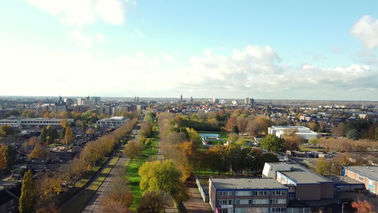 Aerial view of cityscape with autumn trees